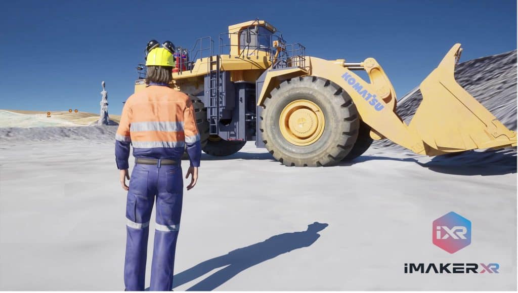 A mining virtual reality training with a mine truck and a worker.